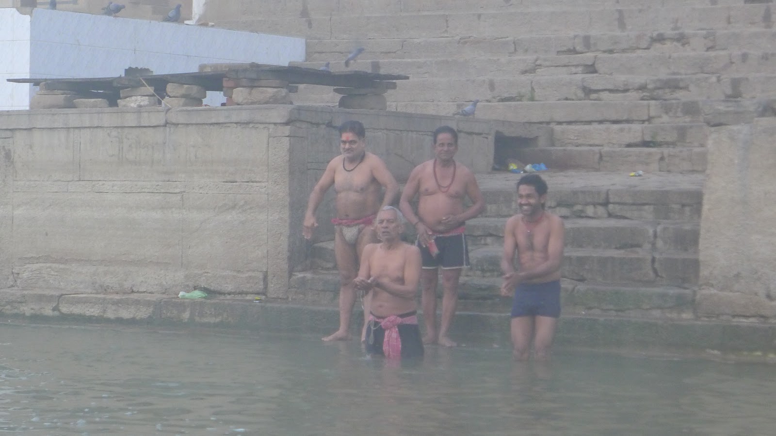 men bathing in the ganges varanasi