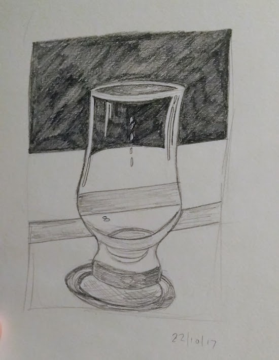 whiskey glass on bar